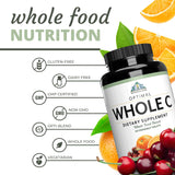 Optimal Health Systems Vitamin C Tablets displayed with fruits