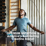 Optimum Nutrition Micronized Creatine Powder with a measuring spoon