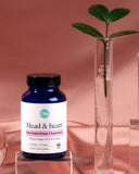 Ora Organic DHA Omega-3 Algae Capsules with a glass of water