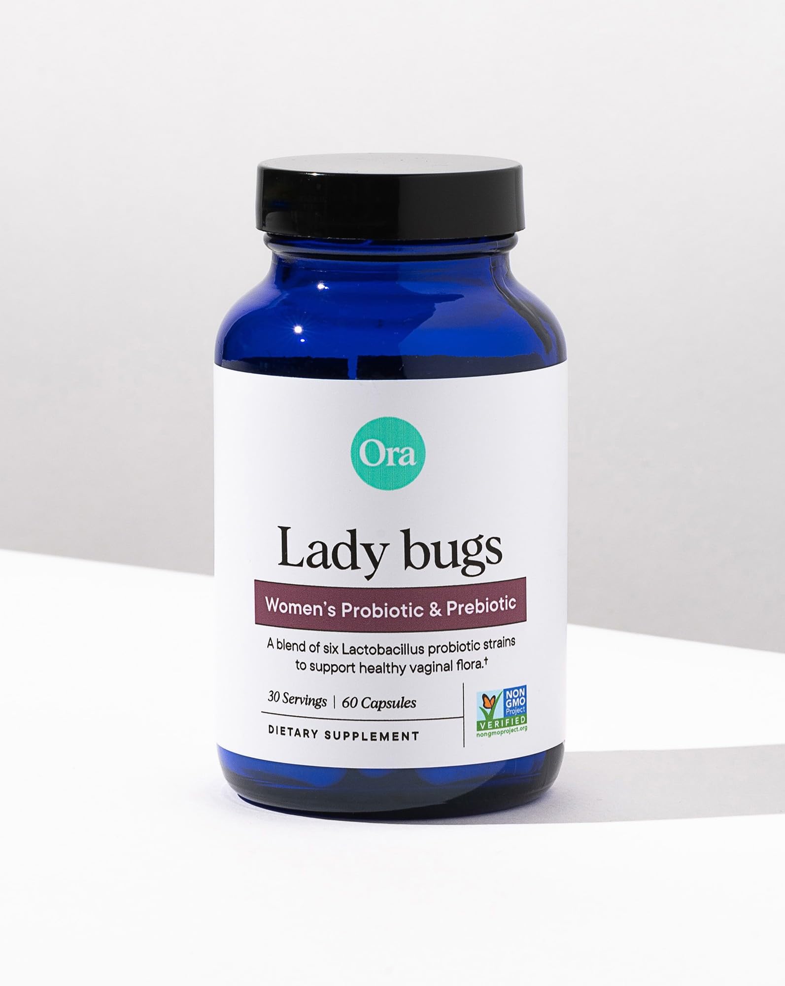 Ora Organic Lady Bugs Prebiotic Capsules opened bottle
