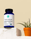 Ora Organic Probiotic Supplement bottle with a measuring scoop