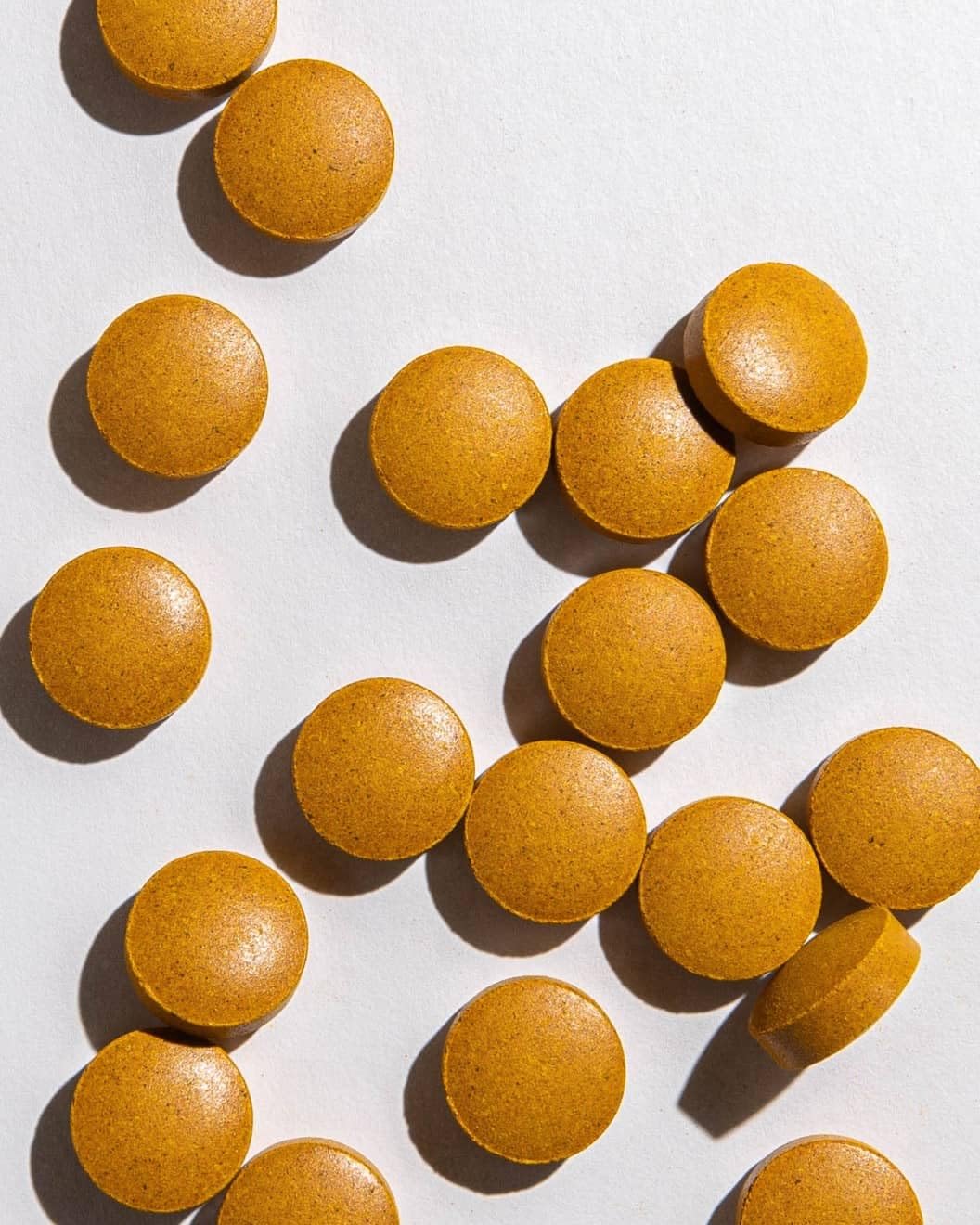 Ora Organic Turmeric Curcumin Supplement 1500mg with a glass of water
