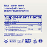 Ora Organic Vitamin D3 & K2 chewable tablets with a glass of water