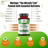 Organic Aura International Moringa Capsules 100g with a measuring spoon