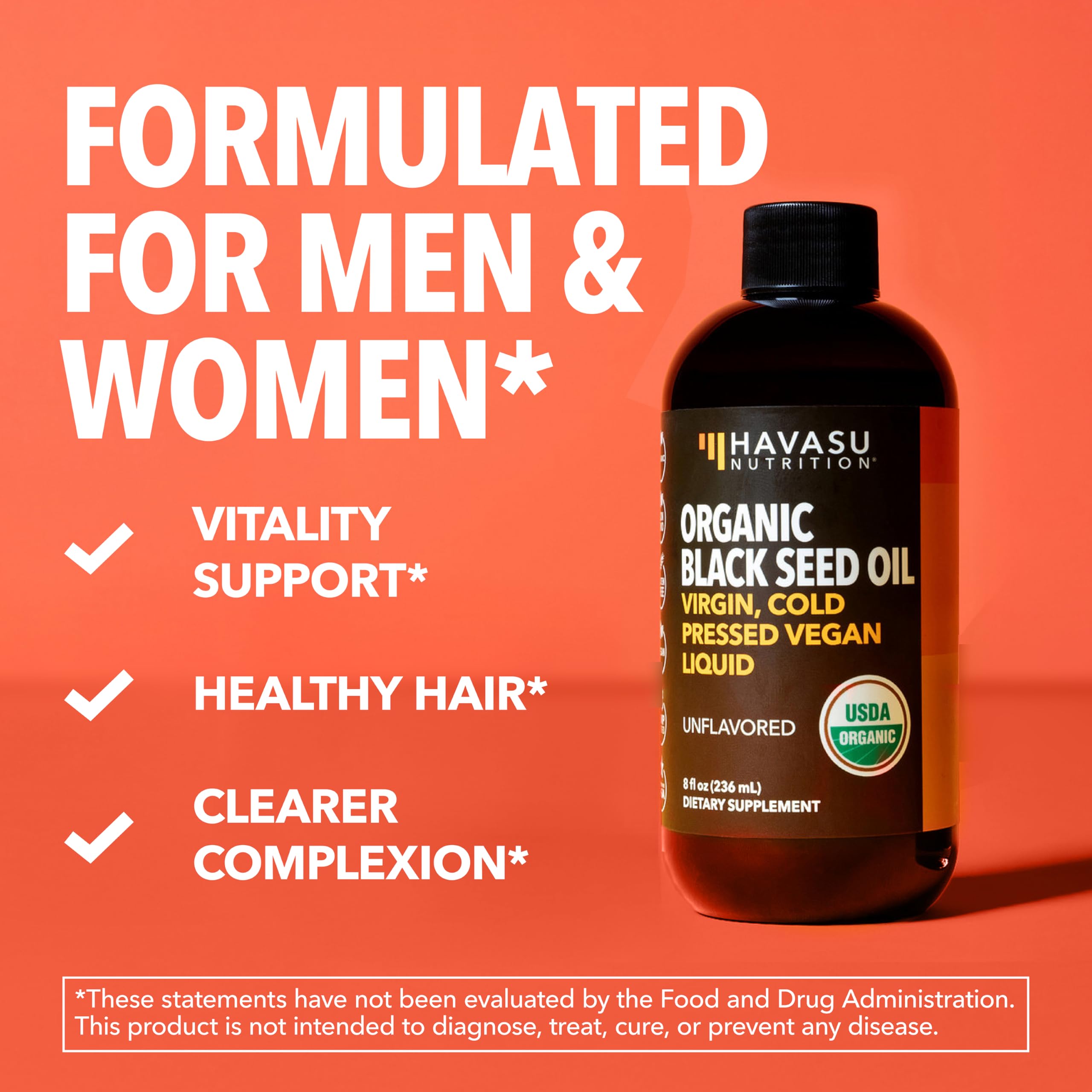 Organic Black Seed Oil in a glass with food