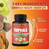 Organic Cadane Triphala Capsules displayed with natural herbs