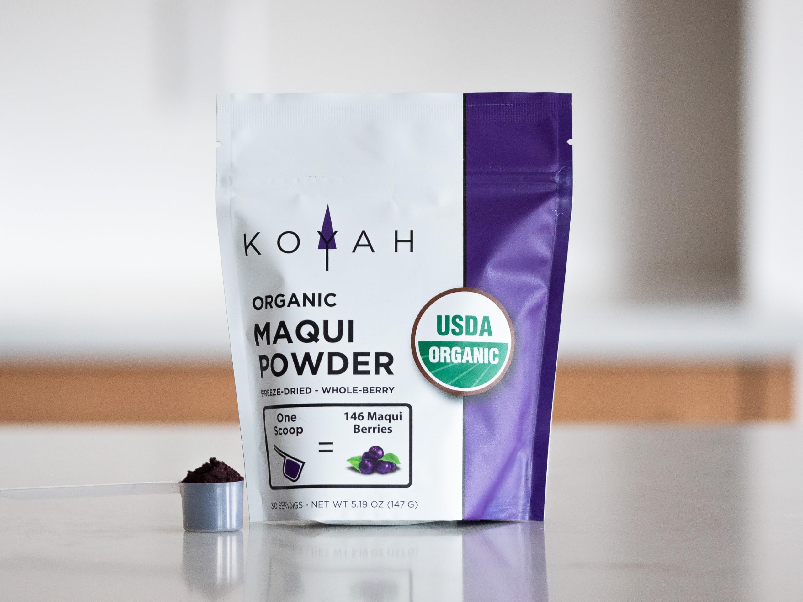 Organic Maqui Berry Powder on a wooden table