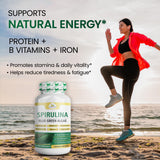 Organic Veda Spirulina Capsules 100g on a wooden table