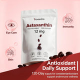 Ormelique Astaxanthin Supplement 12mg softgel on a wooden table