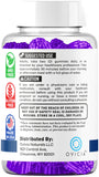 OVICIA Ultra Peak XL Advanced Gummies with a glass of water