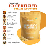 Paleovalley Superfood Golden Milk 440g in a glass with a spoon