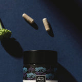 PALO Sleep Supplement capsules in a clear dish