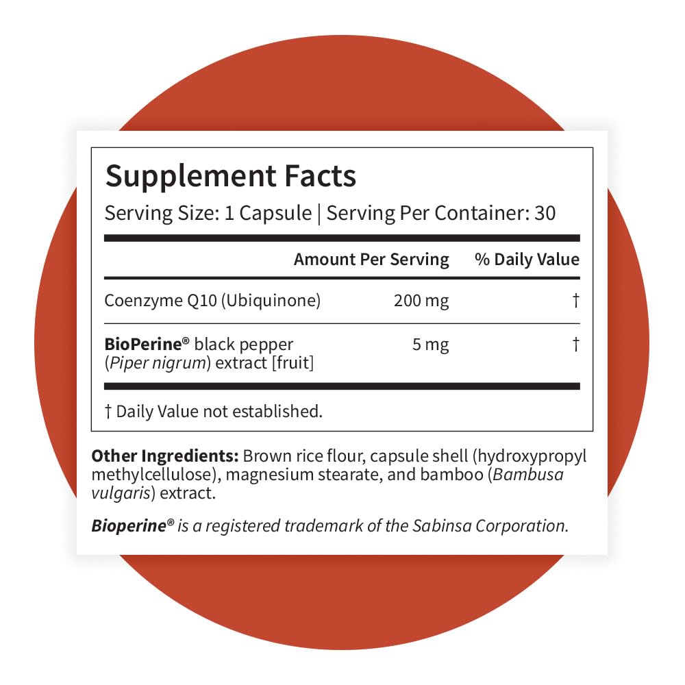 Pattern Wellness CoQ10 Supplement 28g on a wooden table