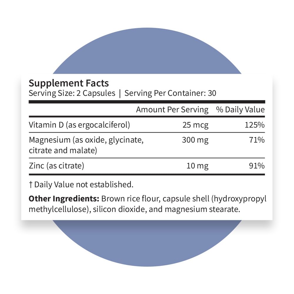 Pattern Wellness Magnesium Complex capsules on a wooden table