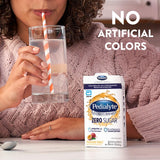 Pedialyte Electrolyte Drink Mix Berry Frost powder in a glass of water