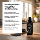 Perfect Press Black Cumin Oil pouring into a spoon