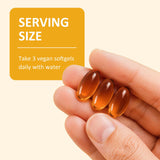 PhytoVital Pumpkin Seed Oil Softgels in a hand for size reference