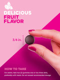 PINK Biotin Gummies with a hand holding a gummy