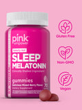 PINK Melatonin Gummies 10mg on a wooden table