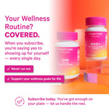 Pink Stork NAD+ Supplement capsules on a wooden surface