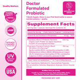 Pink Stork Prenatal Probiotic with a glass of water