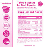 Pink Stork Total Glow Gummies with fresh strawberries