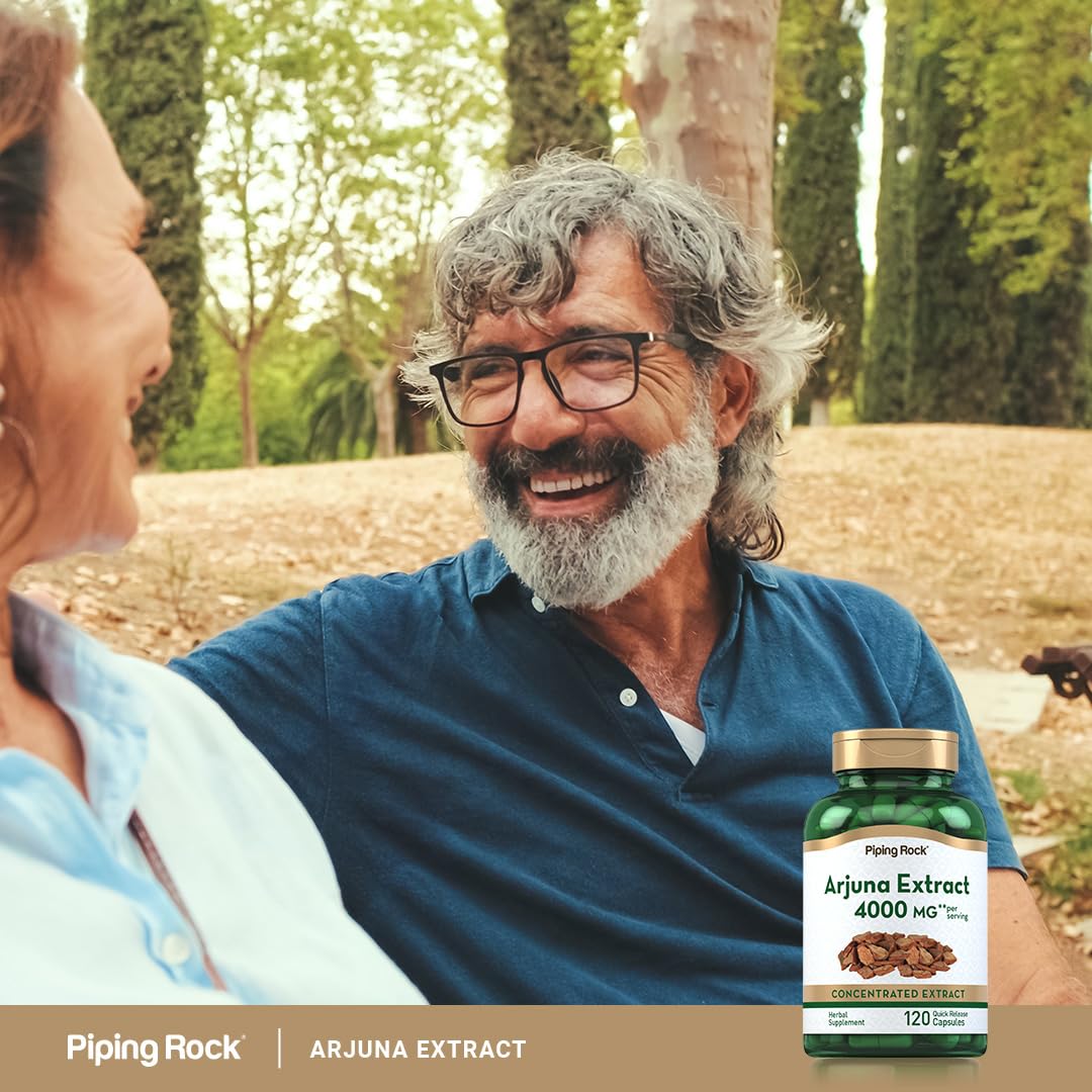 Piping Rock Arjuna Herbal Supplement packaging on a wooden table