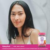 Piping Rock Biotin 181g supplement displayed with other vitamins