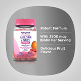 Piping Rock Biotin 181g supplement packaging on a wooden table