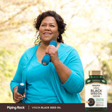 Piping Rock Black Seed Oil 1000 mg softgels on a table