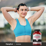 Piping Rock Caffeine Energy Blast capsules on a wooden table