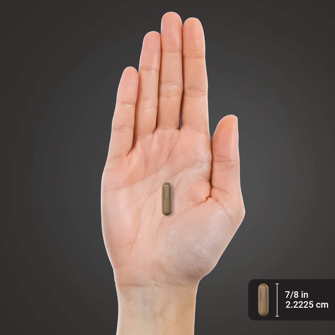 Piping Rock Caffeine Energy Blast capsules with a glass of water