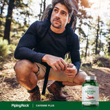 Piping Rock Cayenne Supplement 146g bottle with capsules on a wooden table