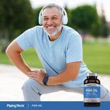 Piping Rock Fish Oil Triple Strength 1,400 mg bottle on a wooden table