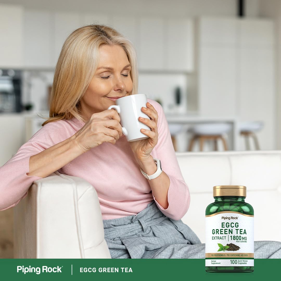 Piping Rock Green Tea Extract capsules in hand