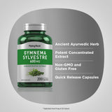 Piping Rock Gymnema Sylvestre capsules on a wooden table