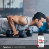 Piping Rock L-Arginine 68g packaging on a gym bench