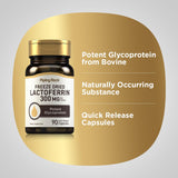 Piping Rock Lactoferrin capsules on a wooden table