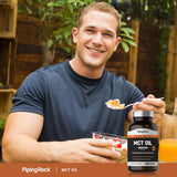 Piping Rock MCT Oil Softgels 314g in a hand for size reference