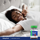Piping Rock Melatonin Gummies 1 mg Cherry Pomegranate on a wooden surface