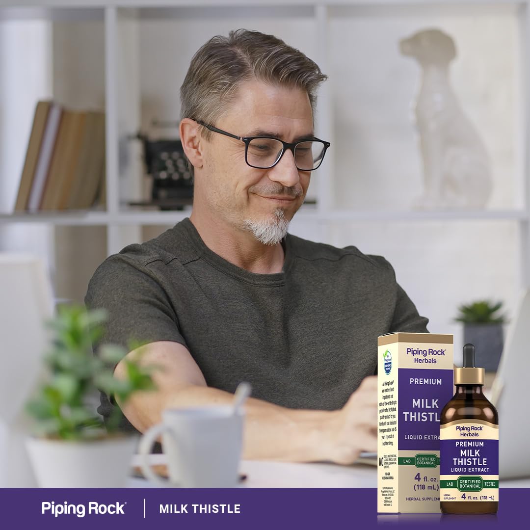Piping Rock Milk Thistle Concentrated Liquid Extract 270g on a wooden table