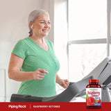 Piping Rock Raspberry Ketones 500 mg supplement on a wooden table