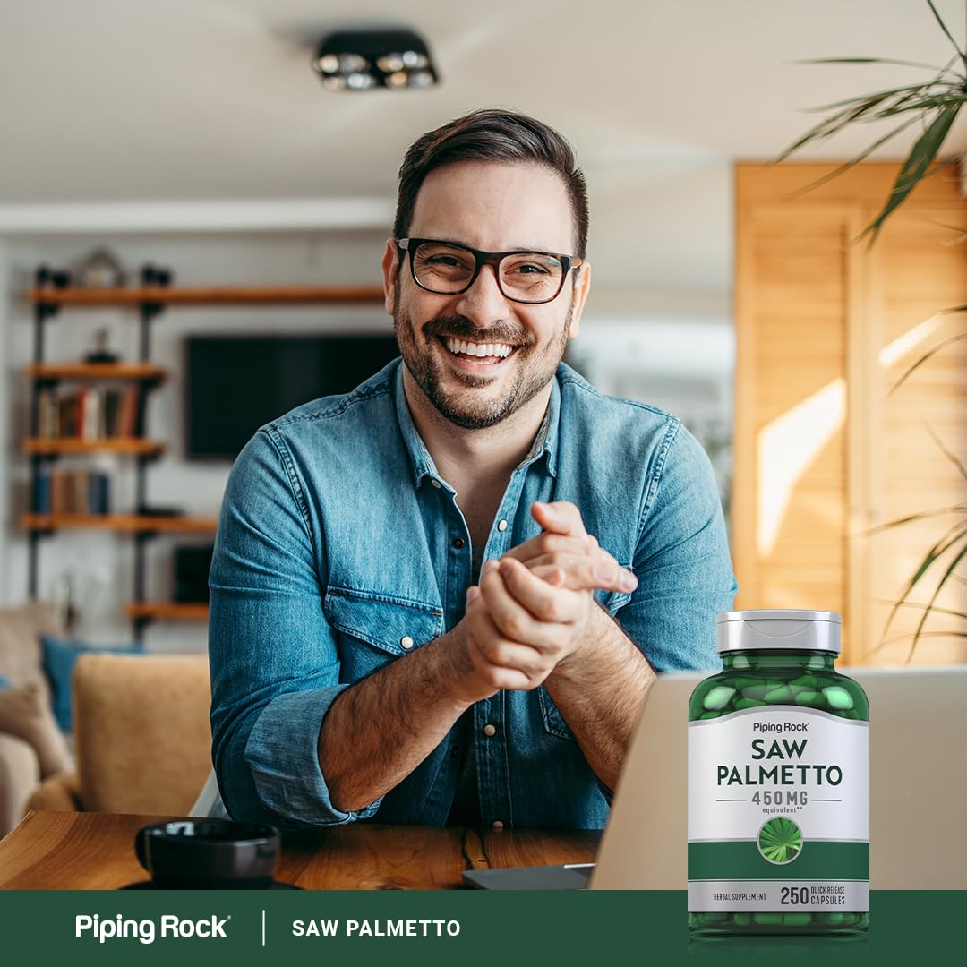Piping Rock Saw Palmetto Extract capsules in a hand