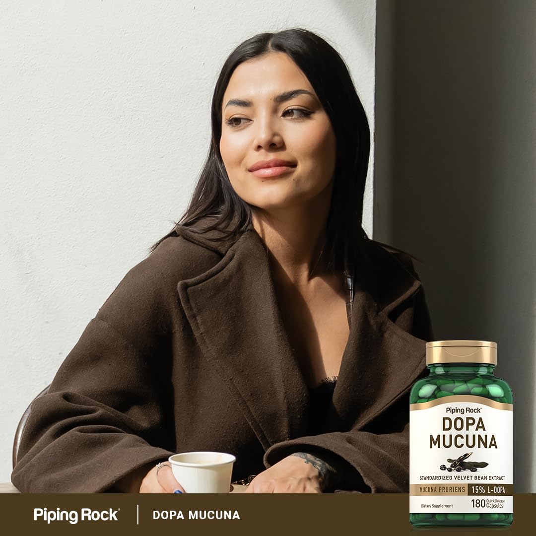 Piping Rock Velvet Bean Extract 15% L-DOPA capsules with a glass of water