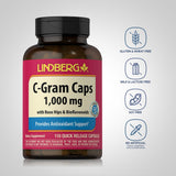 Piping Rock Vitamin C 1,000 mg capsules on a wooden surface