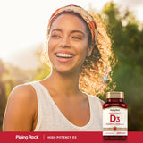 Piping Rock Vitamin D3 softgels on a wooden table