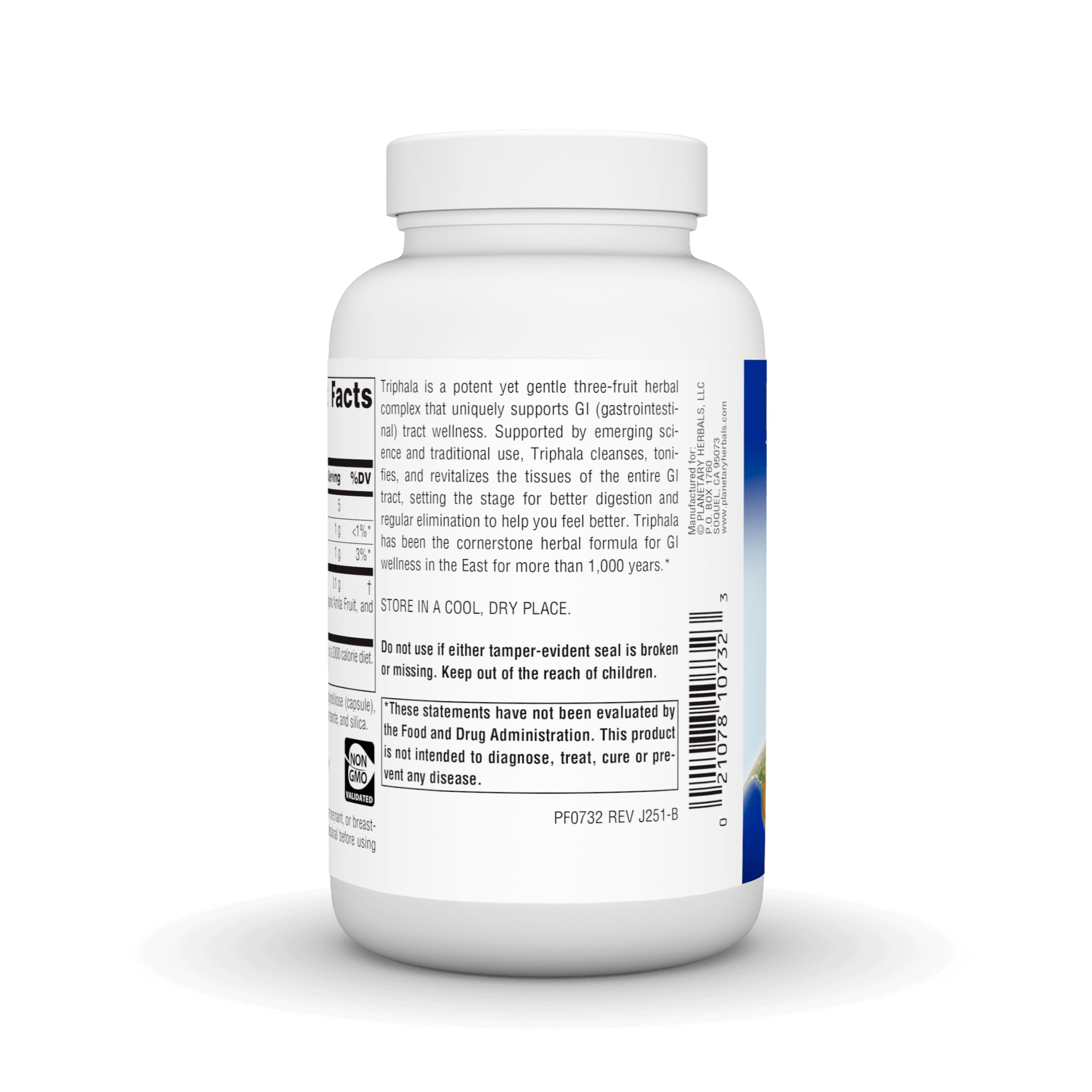 Planetary Herbals Triphala Capsules on a wooden table