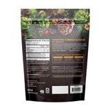 PlantFusion Turmeric & Ginger Drink Mix powder in a glass