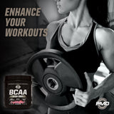 PMD BCAA Powder 261g on a gym bench with weights