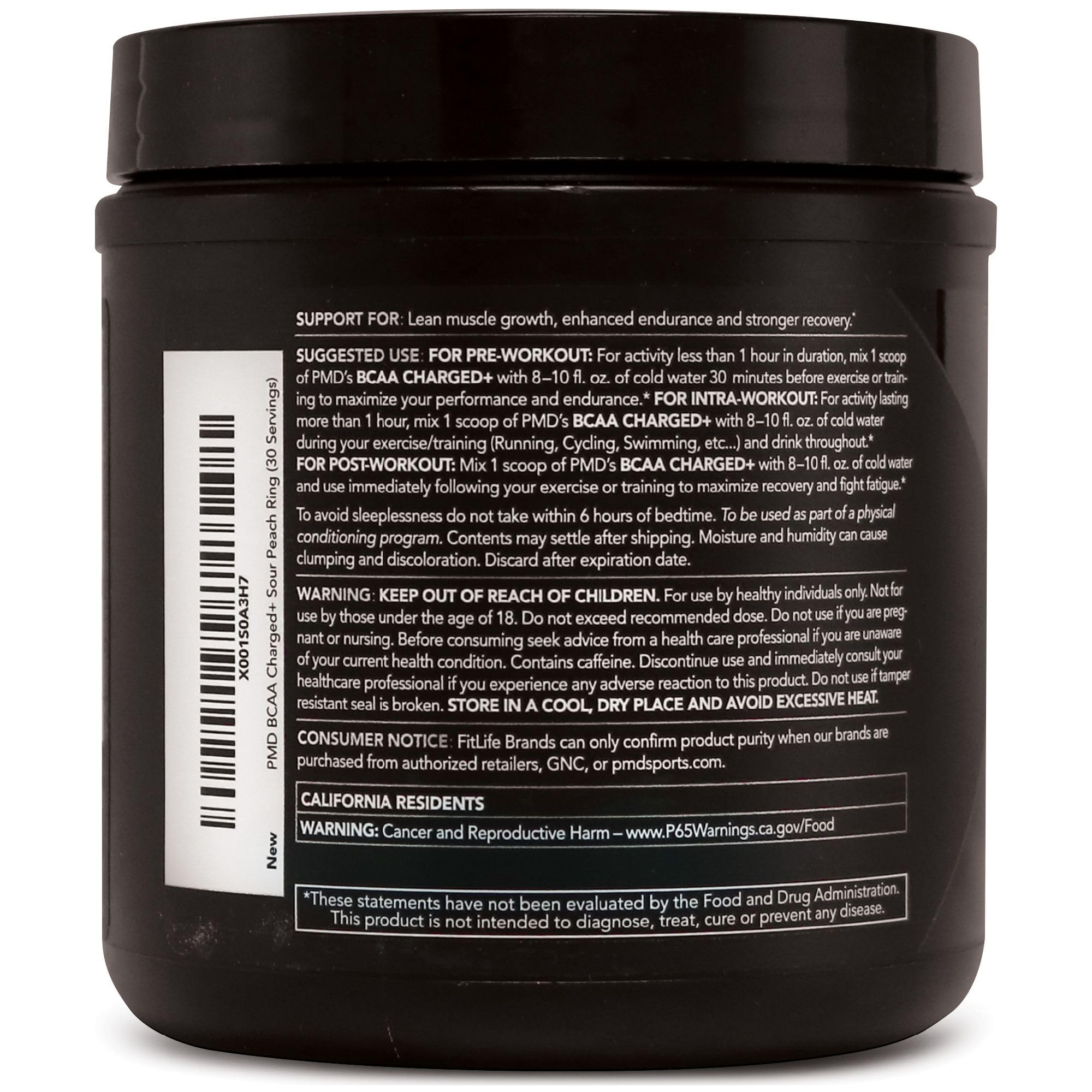 PMD BCAA Powder displayed with fitness equipment
